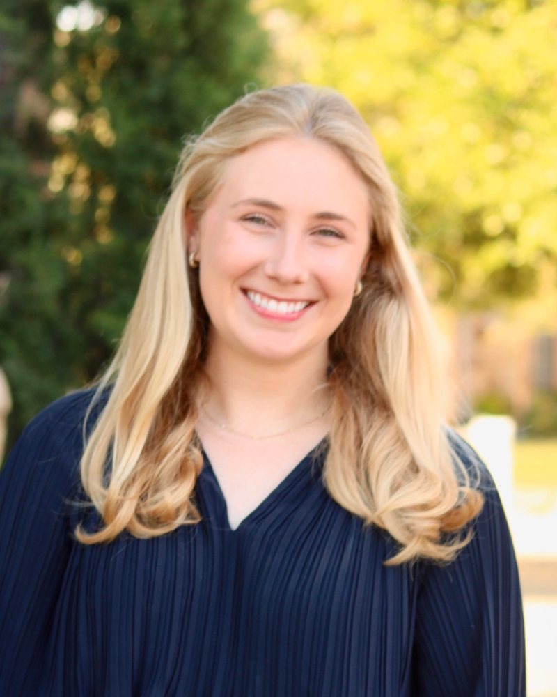 Katherine Montgomery, LCSW, LCDC, smiling outdoors